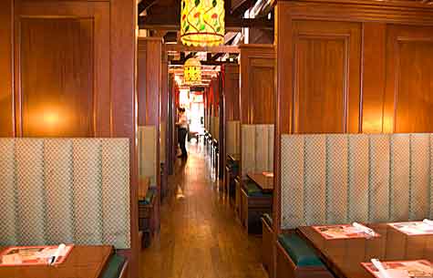 Spaghetti Factory in Fullerton, California, interior view of a row of booths.