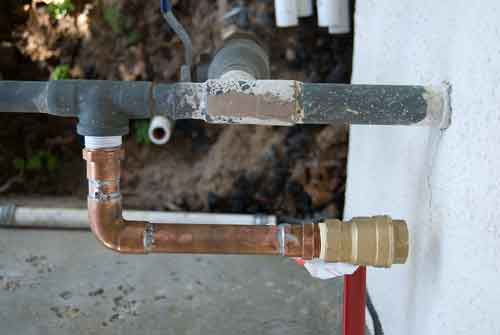 Irrigation valve being installed.