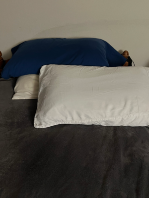 Image shows 3 wide pillows. Bottom pillow at the back is firm or hard. Blue Pillow on top is for the head to rest upon. The white pillow at the front is for the upper body to be placed.